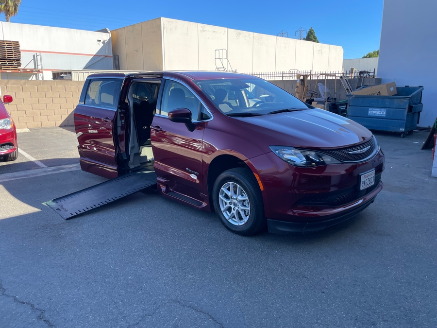 PRE OWNED 2023 Chrysler Voyager LX Base